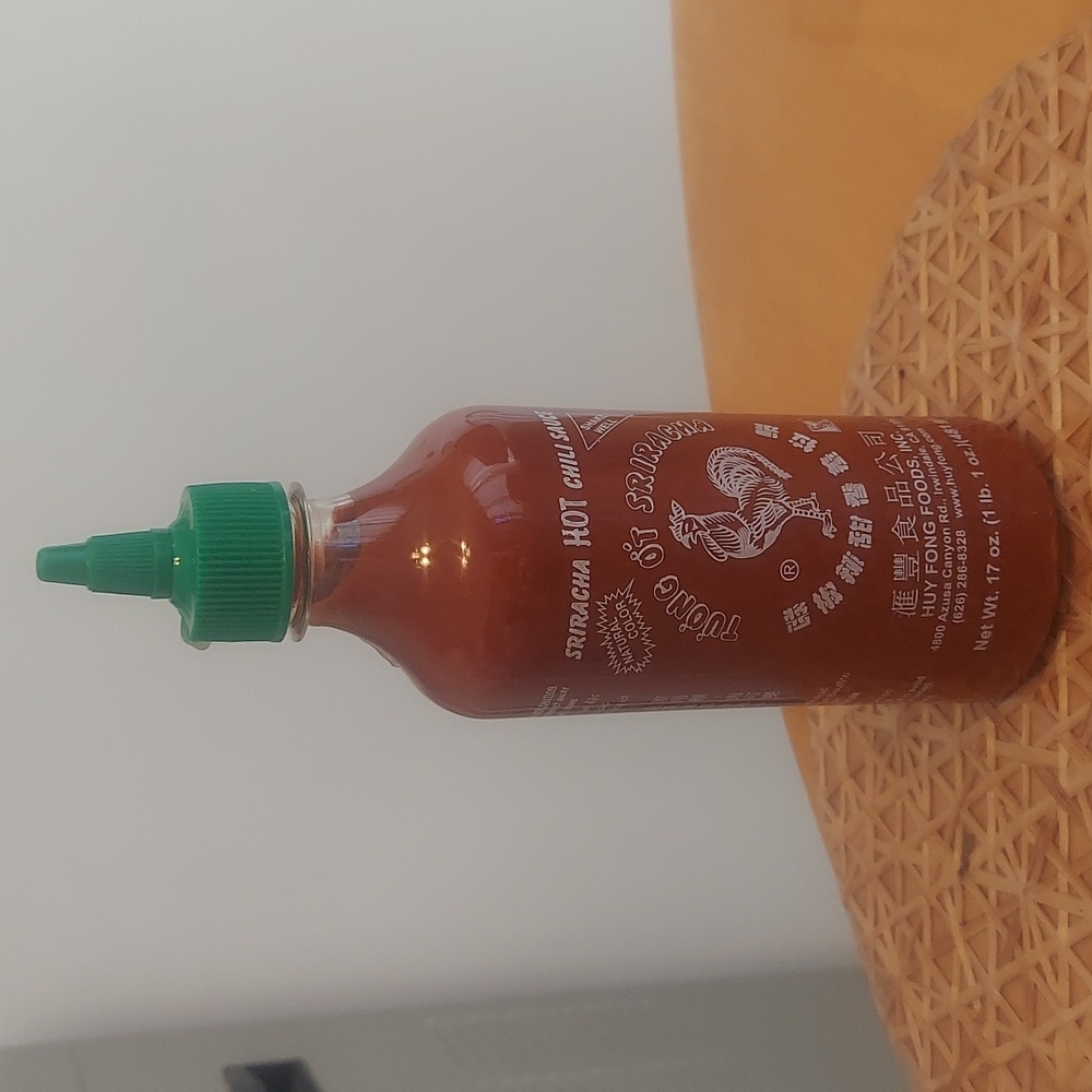 Unopened bottle of Sriracha